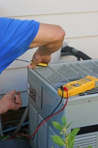 tech-working-on-ac-system