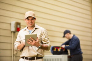 technicians-working-on-a-heat-pump