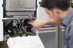 technician-maintaining-a-heater
