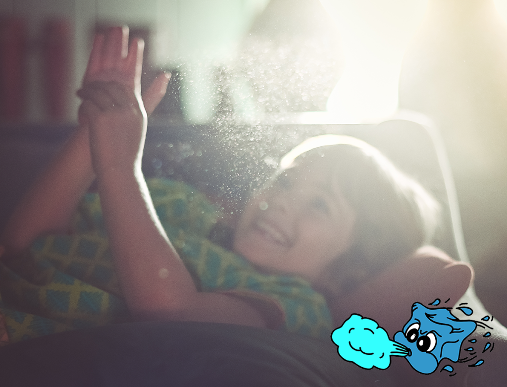 Child at home with dust particles